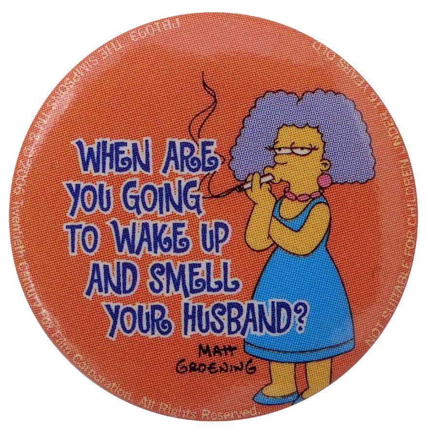 The Simpsons - 'Wake Up and Smell Your Husband' Button Badge