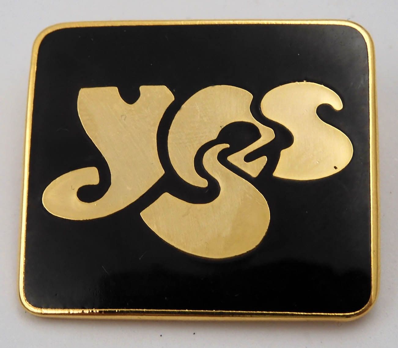 Yes - 'Logo' Black Enamel Badge