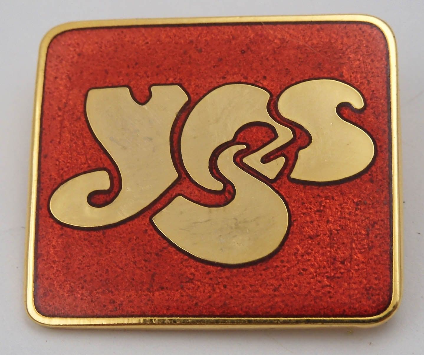 Yes - 'Logo' Red Enamel Badge